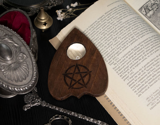 Ouija planchette with pentacle